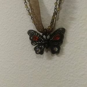 NWOT Brown bead and ribbon chain butterfly necklace. Handmade, one of a kind.
